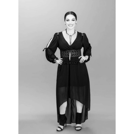 Jacqie Campos is posing for the photo.